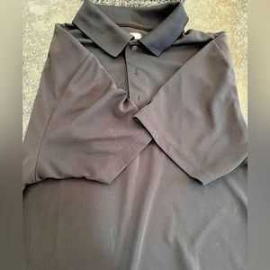 Grand slam performance shirt. 100% polyester. Ribbed material Size M.